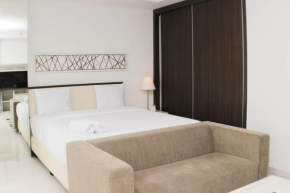 Nice and Comfy Studio Azalea Suites Apartment By Travelio